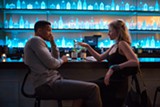 PHOTO COURTESY WARNER BROS. - Will Smith and Margot Robbie share a drink in "Focus."